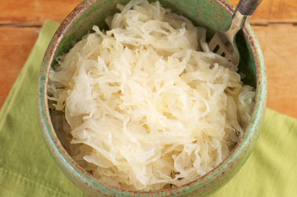 Mindful247 - A bowl of sauerkraut for relieving constipation.